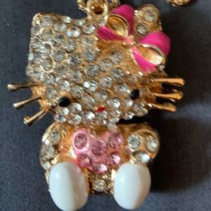 BJ pink/silver Hello Kitty necklace. The necklace is double sided for strength.